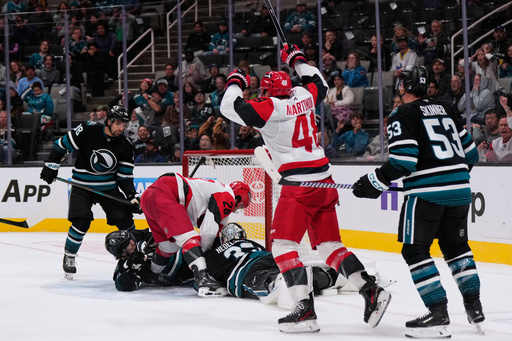 Carolina Hurricanes left wing William Carrier (28) scores a goal against San Jose Sharks goaltender Alex Nedeljkovic (33) during the second period of an NHL hockey game, Tuesday, Oct. 14, 2025, in San Jose, Calif. (AP Photo/Godofredo A. Vásquez) Carolina Hurricanes left wing William Carrier (28) scores a goal against San Jose Sharks goaltender Alex Nedeljkovic (33) during the second period of an NHL hockey game, Tuesday, Oct. 14, 2025, in San Jose, Calif. (AP Photo/Godofredo A. Vásquez)