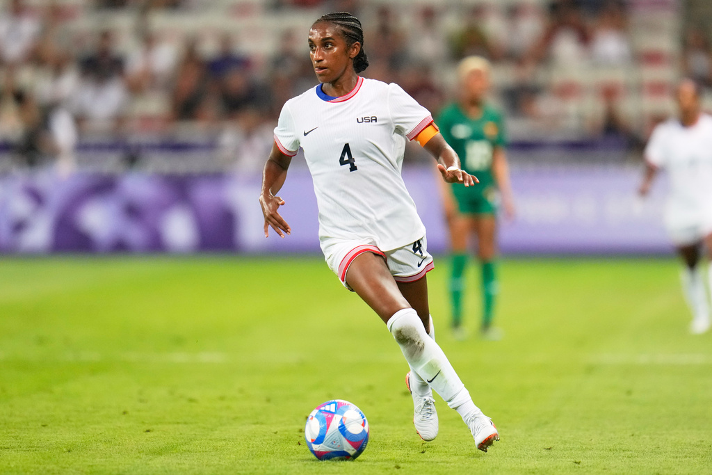FILE - United States' Naomi Girma controls the ball during a women's group B match between the United States and Zambia at Nice Stadium at the 2024 Summer Olympics, July 25, 2024, in Nice, France. (AP Photo/Julio Cortez, File)