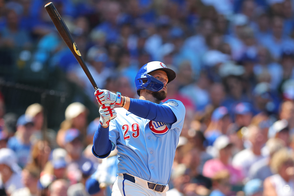 Chicago Cubs' Michael Busch watches his two-run home run during the third inning of a baseball game against the Cincinnati Reds, Friday, Aug. 28, 2026, in Chicago. (AP Photo/Melissa Tamez)