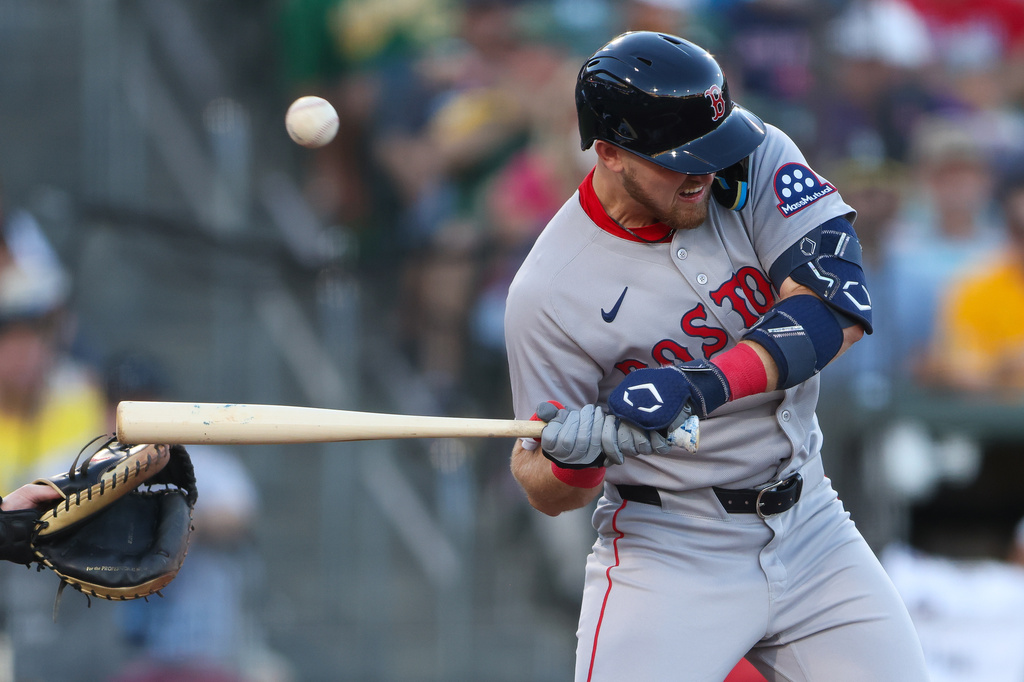 Boston Red Sox's Curtis Mead is hit by a pitch during the fourth inning of a baseball game against the Athletics, Monday, July 27, 2026, in West Sacramento, Calif. (AP Photo/Scott Marshall)