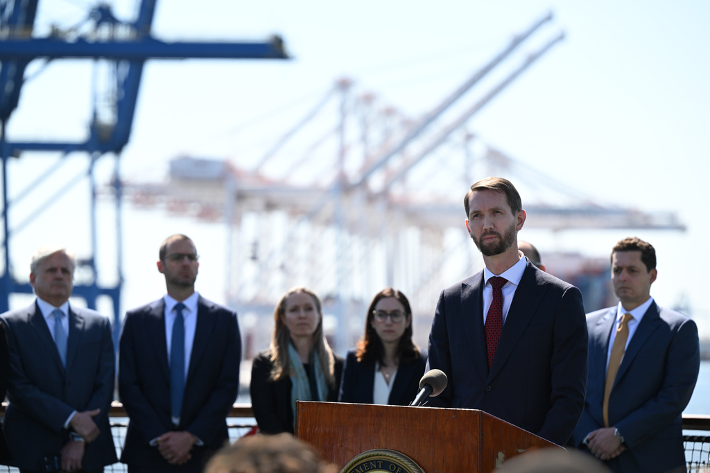 Assistant Attorney General Adam Gustafson updates reporters about the investigation of the Dali container vessel and Francis Scott Key Bridge during a news conference Tuesday, May 12, 2026 in Baltimore. (AP Photo/Gail Burton)
