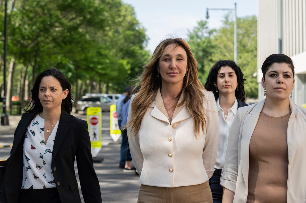 FILE - Nicole Daedone, center, founder and former CEO of OneTaste, departs Brooklyn federal court on Tuesday, June 13, 2023 in New York. (AP Photo/Jeenah Moon, File)