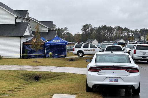 Law enforcement vehicles block Wellington Delano Dickens III's home, where remains were found after Dickens told authorities he had killed four of his children, in Zebulon, N.C., on Tuesday, Oct. 28, 2025. (AP Photo/Allen G. Breed) Law enforcement vehicles block Wellington Delano Dickens III's home, where remains were found after Dickens told authorities he had killed four of his children, in Zebulon, N.C., on Tuesday, Oct. 28, 2025. (AP Photo/Allen G. Breed)