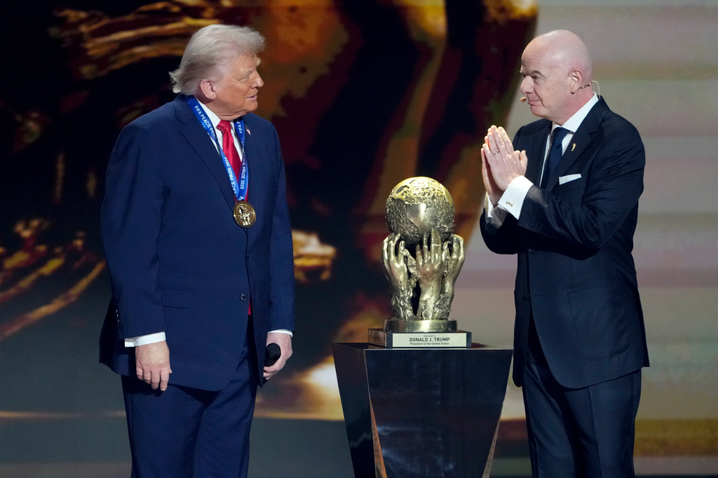 FILE - FIFA President Gianni Infantino, right, awards President Donald Trump with the FIFA Peace Prize during the draw for the 2026 soccer World Cup at the Kennedy Center in Washington, Friday, Dec. 5, 2025. (AP Photo/Chris Carlson, file)