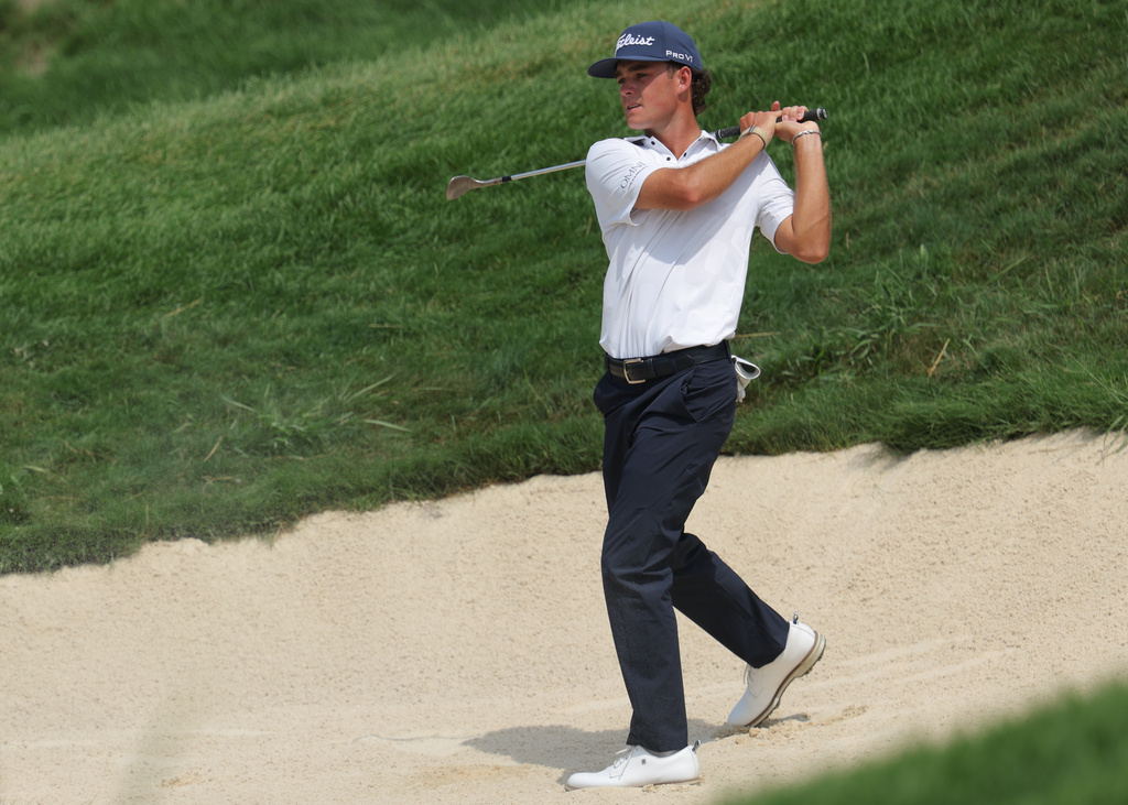 Jackson Koivun hits on the ninth hole during the final round of the 3M Open golf tournament at the Tournament Players Club Sunday, July 26, 2026, in Blaine, Minn. (AP Photo/Bailey Hillesheim)