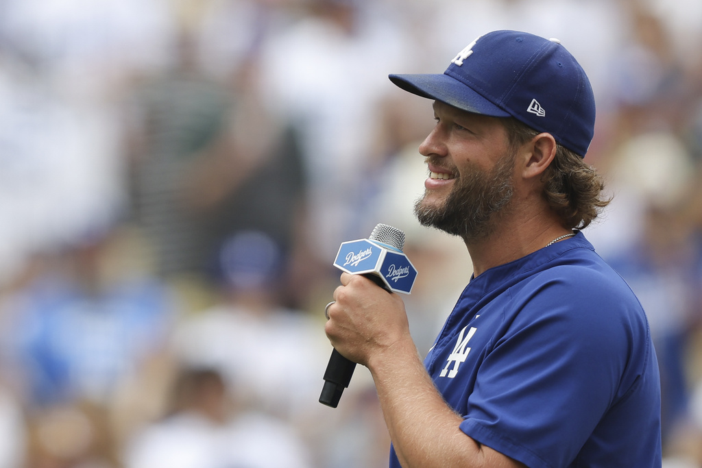 Los Angeles Dodgers pitcher Clayton Kershaw speaks to fans before a baseball game against the San Francisco Giants, Sunday, Sept. 21, 2025, in Los Angeles. (AP Photo/Jessie Alcheh)