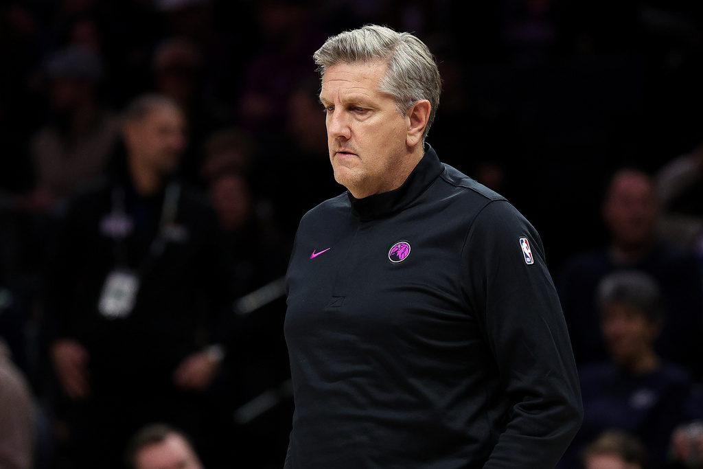 Minnesota Timberwolves head coach Chris Finch looks on during the first half of an NBA basketball game against the Golden State Warriors, Sunday, Jan. 25, 2026, in Minneapolis. (AP Photo/Matt Krohn)