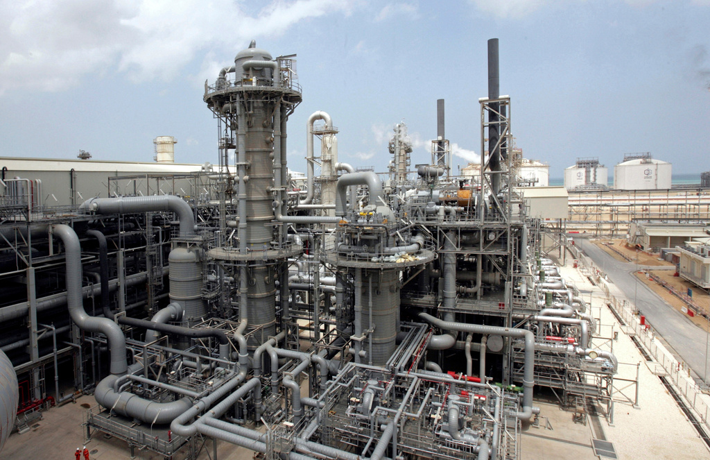 FILE - This April 4, 2009, file photo, shows a gas production facility at Ras Laffan, Qatar. (AP Photos/Maneesh Bakshi, File)