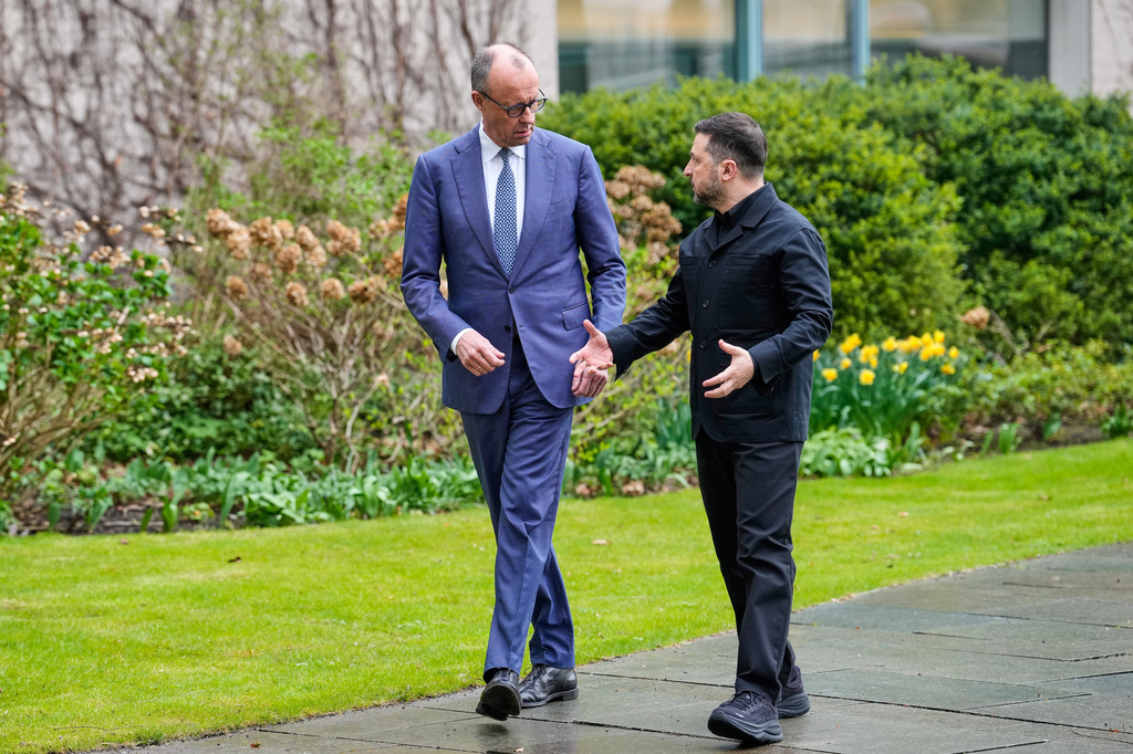 German chancellor Friedrich Merz welcomes Ukraine's President Volodymyr Zelenskyy for German-Ukrainian government consultations in Berlin Germany, Tuesday, April 14, 2026. (AP Photo/Ebrahim Noroozi)