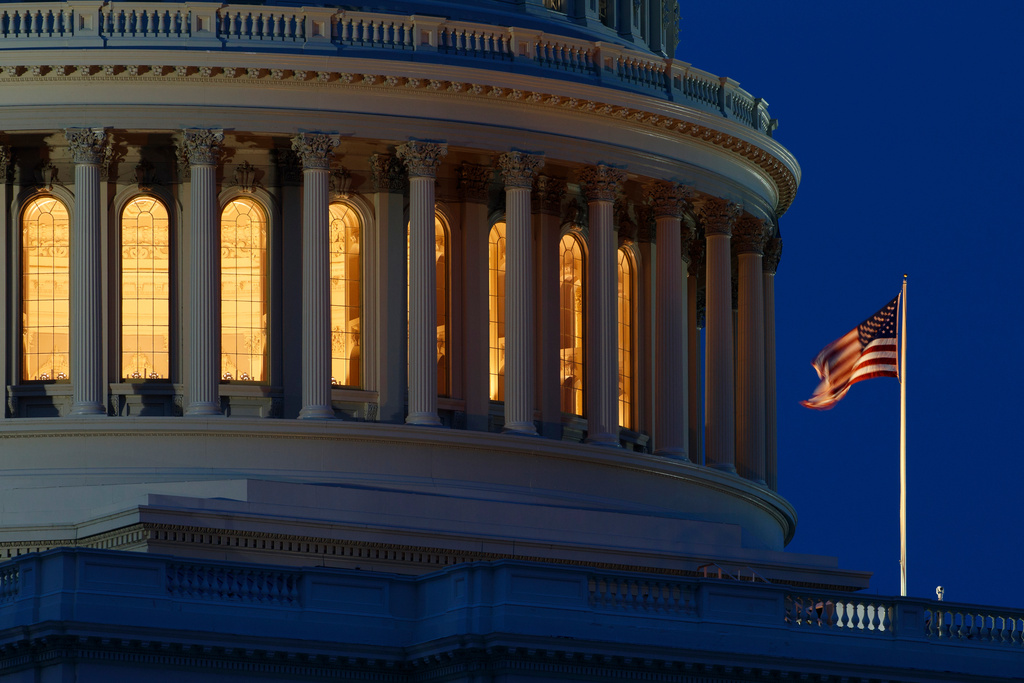FILE - An American flag flies on the Capitol Dome in Washington on July 16, 2019. (AP Photo/Carolyn Kaster, File)