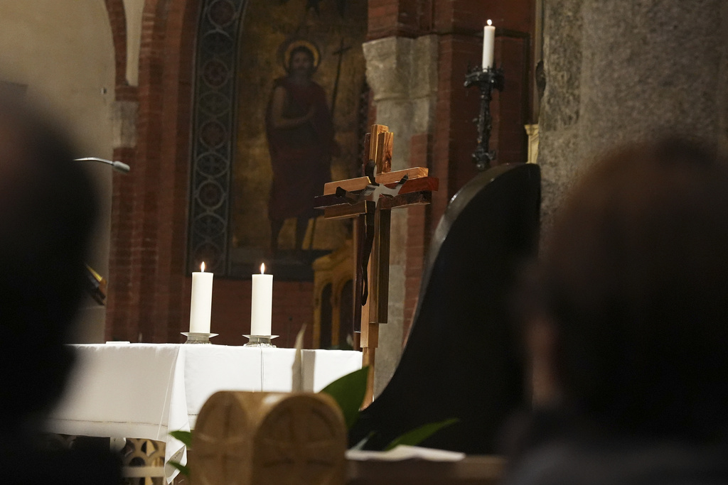 The “Cross of Athletes” is seen during a Mass at the Basilica of San Babila, known as the Church of Athletes during the 2026 Winter Olympics, in Milan, Italy, Saturday, Feb. 8, 2026. The cross travels to Olympic host cities as a symbol of faith, unity, and the values of sport. (AP Photo/María Teresa Hernandez)