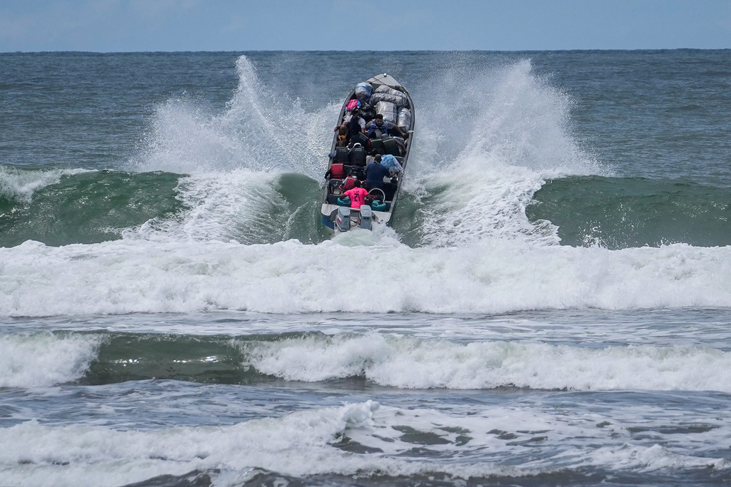 FILE - Venezuelan migrants depart Jaque on Panama's Pacific coast en route to Jurado, Colombia, as they return home after failing to enter the United States, Sept. 19, 2025. (AP Photo/Matias Delacroix, File)