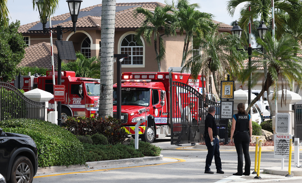 Emergency personnel from Coral Springs and Coconut Creek are on scene where a plane crashed in the Windsor Bay community in Coral Springs on Monday, Nov. 10, 2025. (Carline Jean/South Florida Sun-Sentinel via AP)