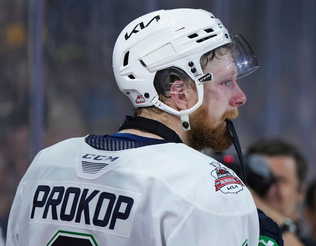 FILE - Seattle Thunderbirds' Luke Prokop bites the blade of his stick as he looks on after the Quebec Remparts defeated Seattle during CHL Memorial Cup final hockey action, June 4, 2023, in Kamloops, British Columbia. (Darryl Dyck/The Canadian Press via AP, File)