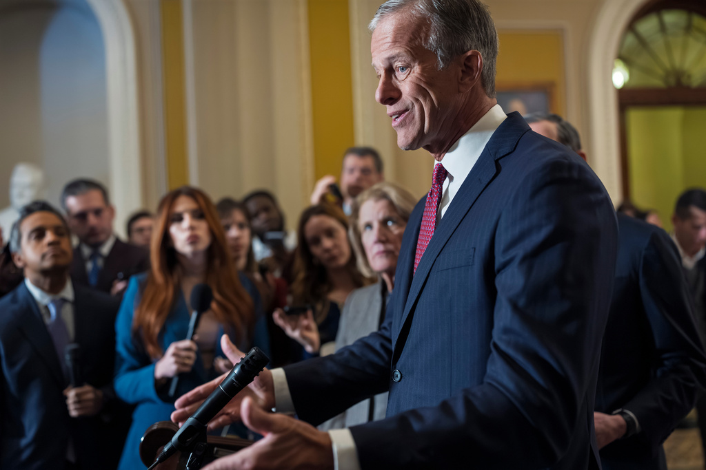 With a partial government shutdown looming by week's end, Senate Majority Leader John Thune, R-S.D., speaks to reporters following a closed-door meeting with fellow Republicans on spending legislation that funds the Department of Homeland Security and a swath of other government agencies as the country reels from the deaths of two people at the hands of federal agents in Minneapolis, at the Capitol in Washington, Wednesday, Jan. 28, 2026. (AP Photo/J. Scott Applewhite)