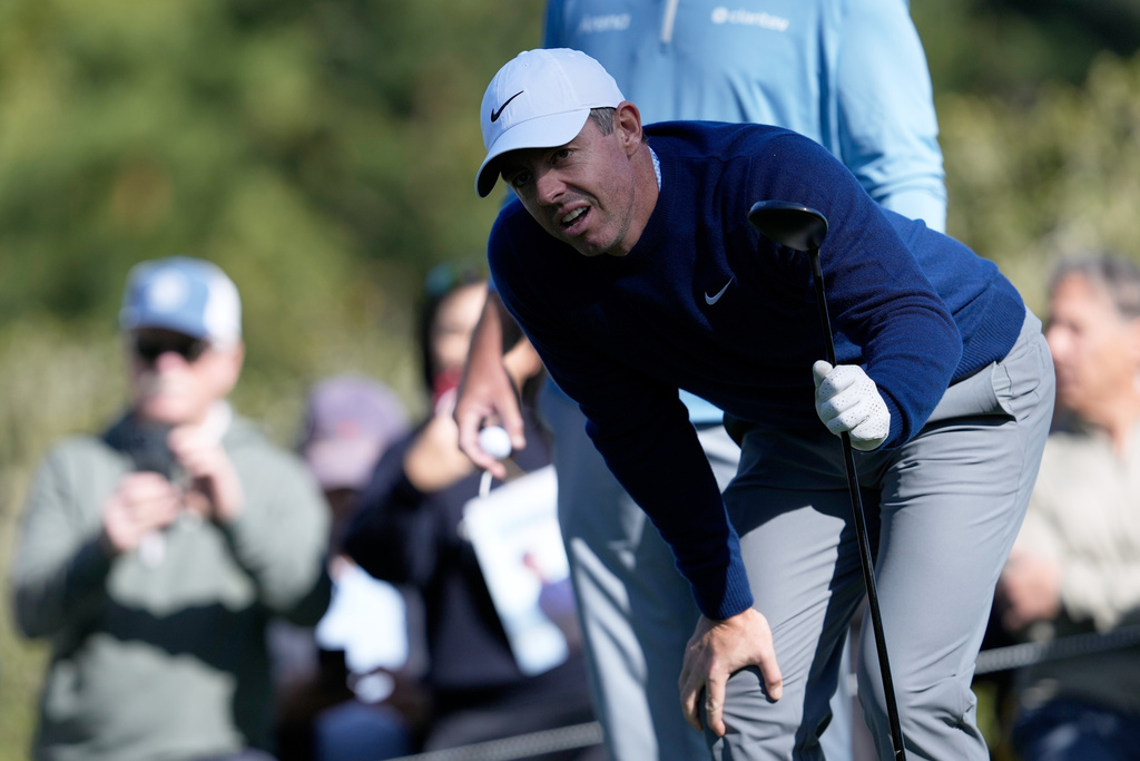 Rory McIlroy, from Northern Ireland, reacts after hitting from the 17th tee at Spyglass Hill Golf Course during the first round of the AT&T Pebble Beach Pro-Am golf tournament in Pebble Beach, Calif., Thursday, Feb. 12, 2026. (AP Photo/Godofredo A. Vásquez)