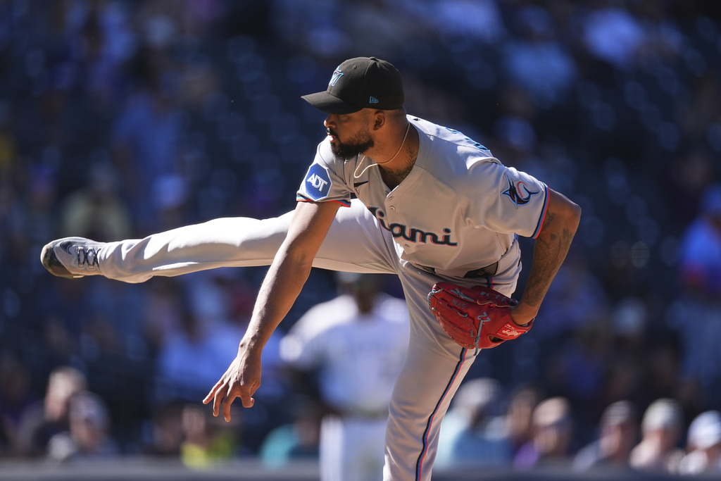 Miami Marlins starting pitcher Sandy Alcantara works against the Colorado Rockies in the seventh inning of a baseball game Thursday, Sept. 18, 2025, in Denver. (AP Photo/David Zalubowski)