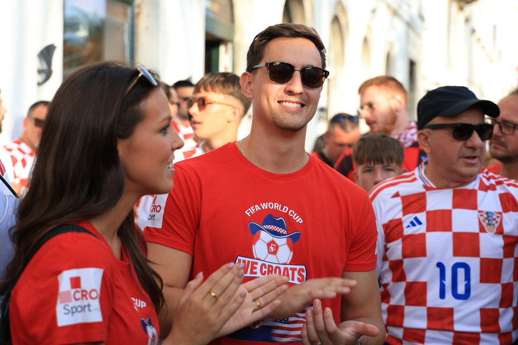 Ashton and Zachary Smith gather with Croatian supporters prior to the Nations League soccer match between Croatia and Spain, in Split, Croatia, Tuesday, Oct. 6, 2026. (AP Photo)