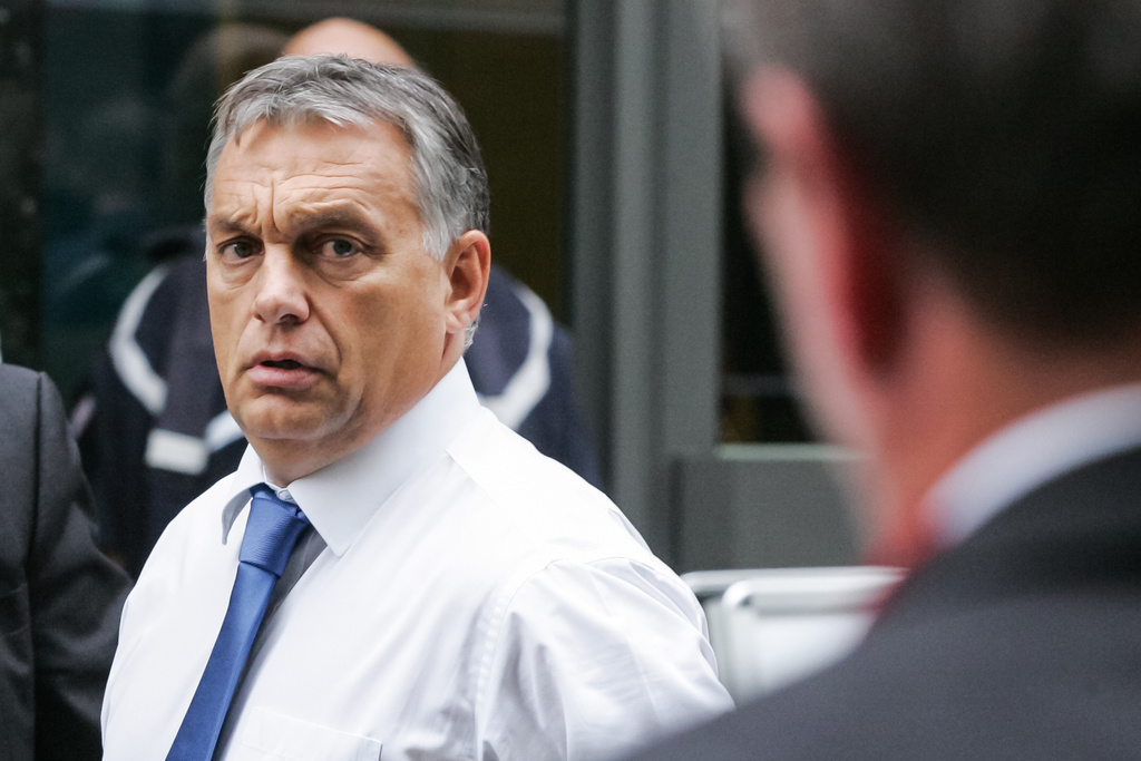 FILE -Hungarian Prime Minister Viktor Orban, right, arrives for a European Peoples Party, EPP meeting, ahead of an emergency EU heads of state summit on migration, in Brussels on Sept. 23, 2015. (AP Photo/Francois Walschaerts, File)