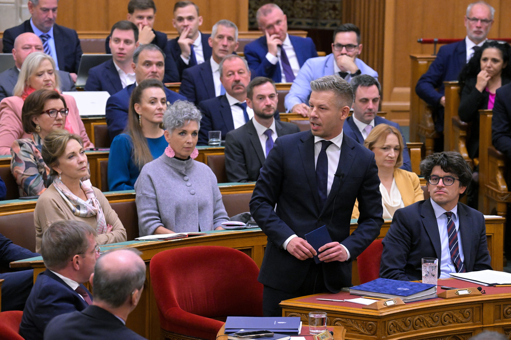 Hungarian Prime Minister Peter Magyar, center, attends an extraordinary session of the National Assembly, in Budapest, Hungary, Monday, Sept. 28, 2026. (Zsolt Szigetvary/MTI via AP)