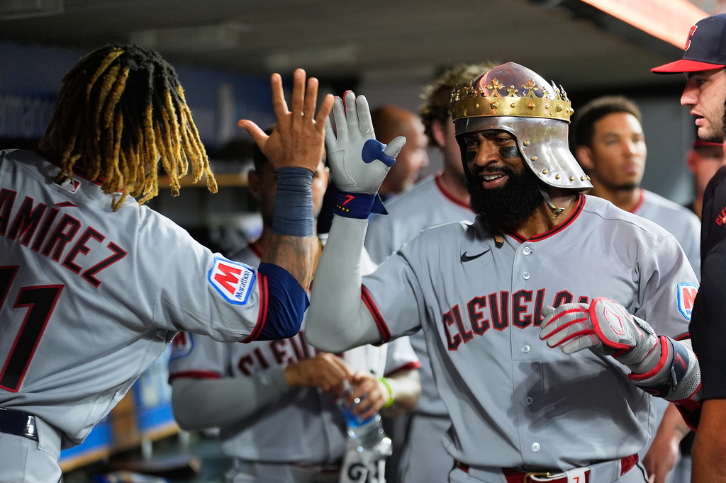 Cleveland Guardians' Jo Adell celebrates his home run against the Detroit Tigers during the eighth inning of a baseball game Tuesday, Aug. 11, 2026, in Detroit. (AP Photo/Paul Sancya)
