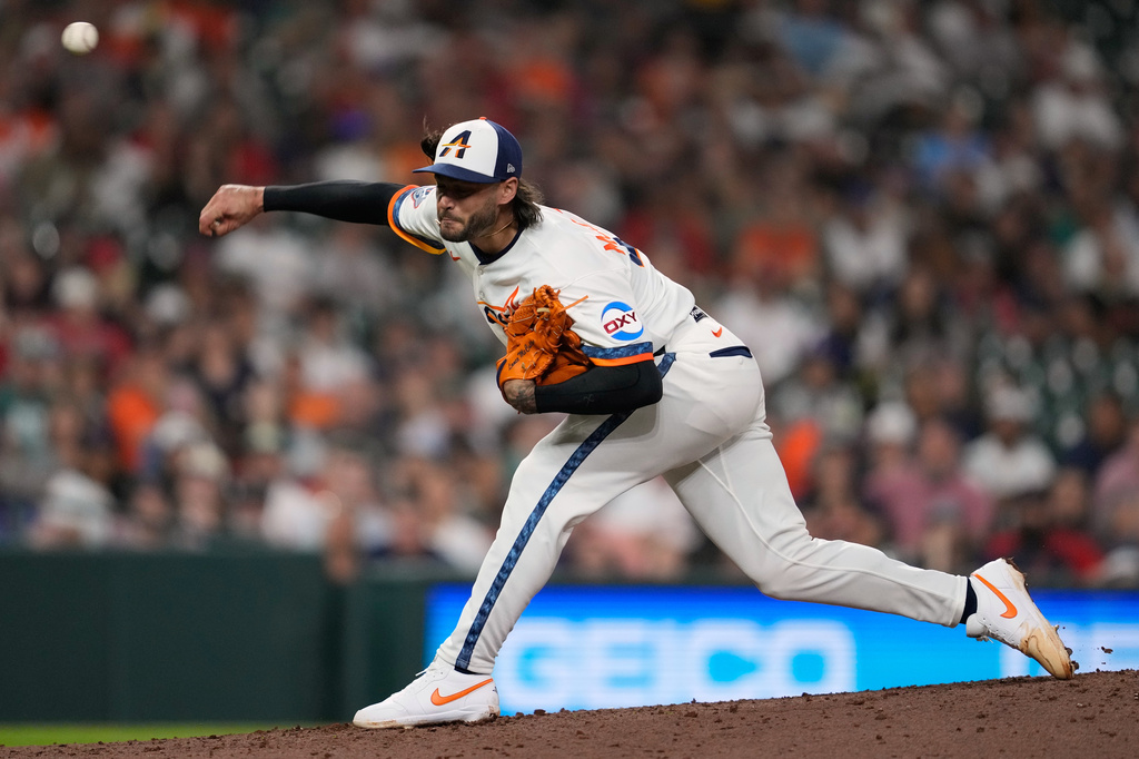 Houston Astros starting pitcher Lance McCullers Jr. throws during the seventh inning of a baseball game against the Boston Red Sox in Houston, Monday, March 30, 2026. (AP Photo/Ashley Landis)