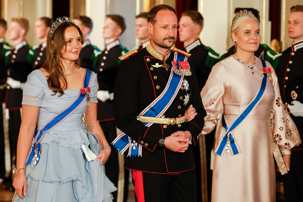 FILE - From left, Norway's Princess Ingrid Alexandra, left, Crown Prince Haakon and Crown Princess Mette-Marit on their way to a gala dinner at the Palace in Oslo, Tuesday, April 8, 2025. (Fredrik Varfjell/NTB via AP, File)
