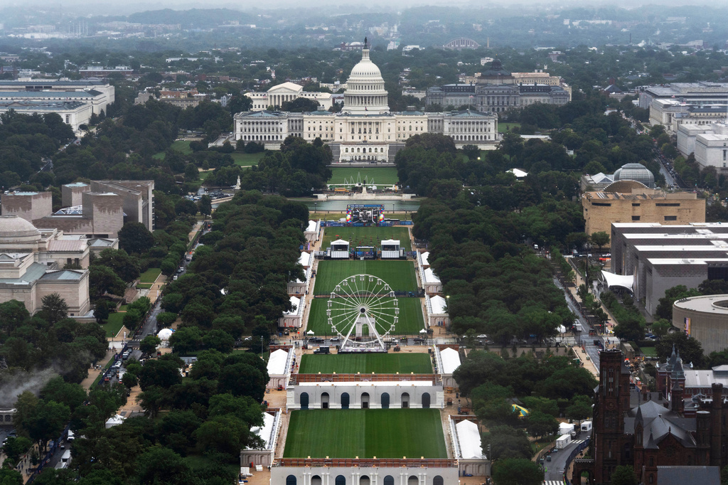 A Ferris wheel is seen on the National Mall for the 250 Anniversary celebration, Tuesday, June 23, 2026, in Washington. (AP Photo/Manuel Balce Ceneta)