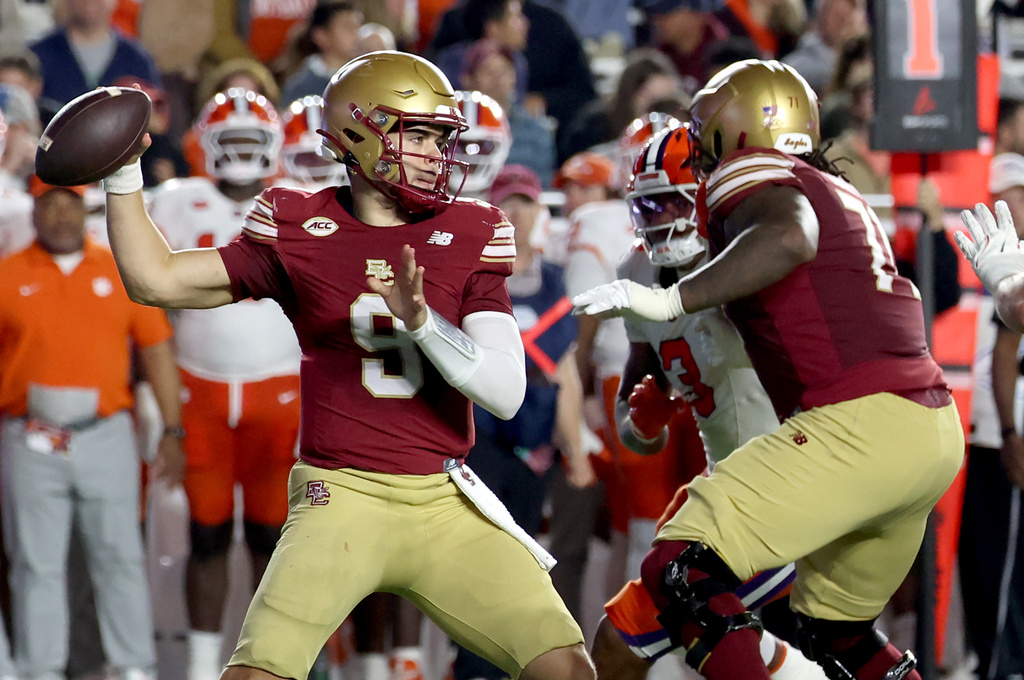 Boston College quarterback Dylan Lonergan (9) eyes a receiver during the second half of an NCAA college football game against Clemson, Saturday, Oct. 11, 2025 in Boston. (AP Photo/Mark Stockwell)