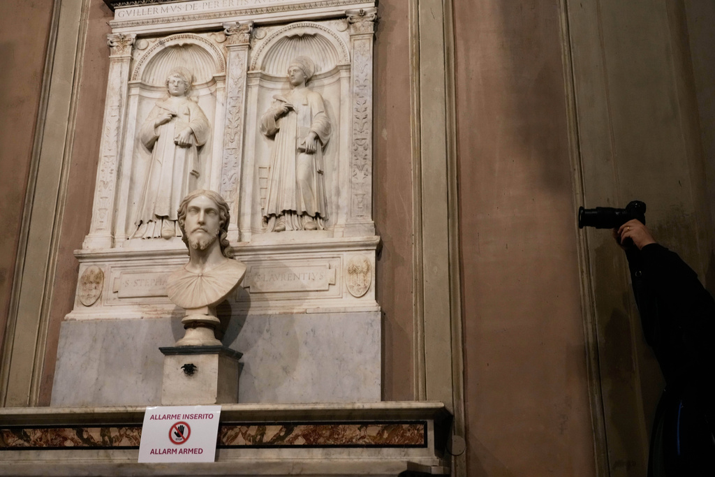The sculpted bust inside the Basilica of Saint Agnes Outside the Walls, in Rome, Wednesday, March 4, 2026, which, in light of new studies by Italian researcher Valentina Salerno, may be reattributed to Michelangelo Buonarroti. (AP Photo/Gregorio Borgia)