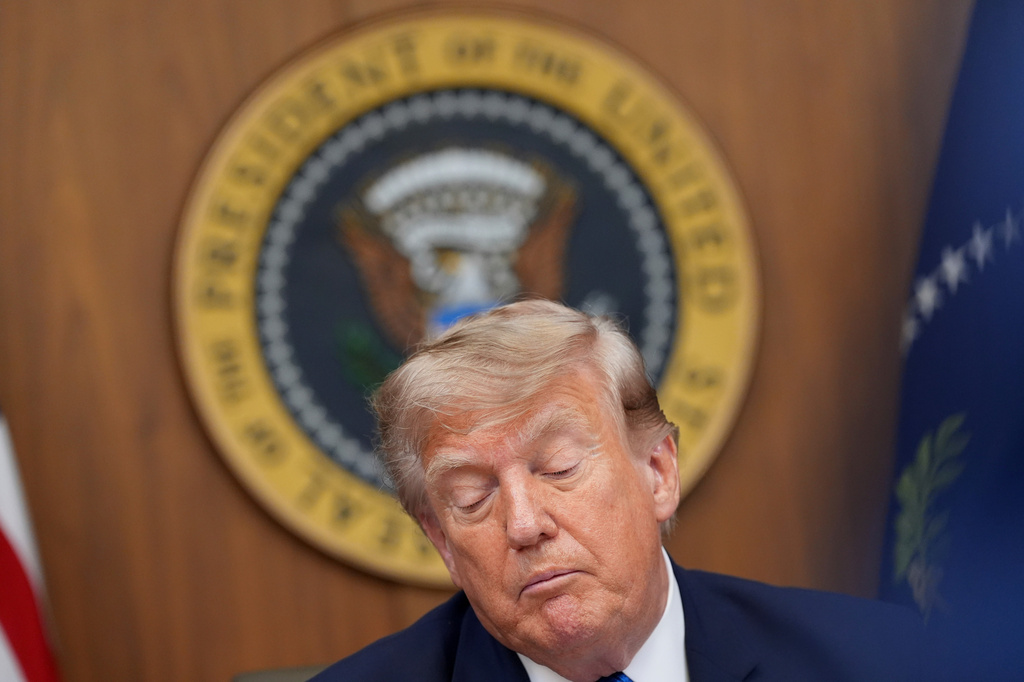 President Donald Trump listens during a cabinet meeting, Friday, July 31, 2026, at Camp David, the presidential retreat, near Thurmont, Md., Friday, July 31, 2026. (AP Photo/Jacquelyn Martin)
