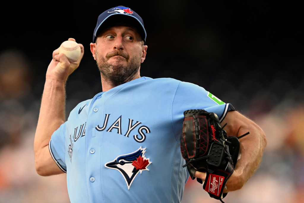 Toronto Blue Jays staring pitcher Max Scherzer throws during the second inning of a baseball game against the Washington Nationals, Monday, July 27, 2026, in Washington. (AP Photo/John McDonnell)