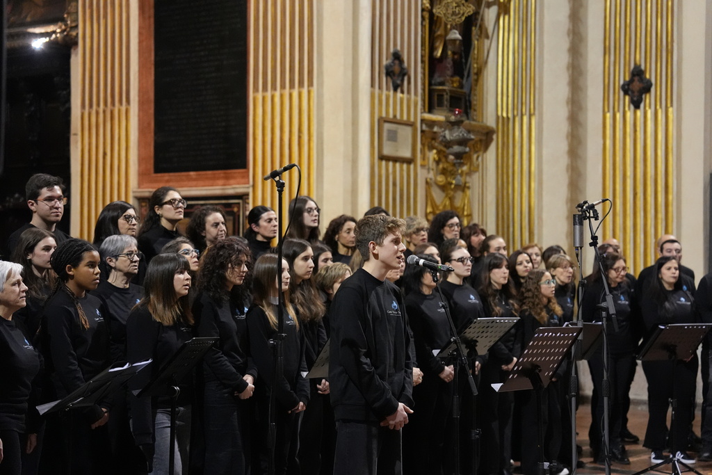 Coro Terzo Tempo perform during a concert at the church of Sant’Antonio Abate in Milan, Italy, on Feb. 18, 2026. (AP Photo/María Teresa Hernández)