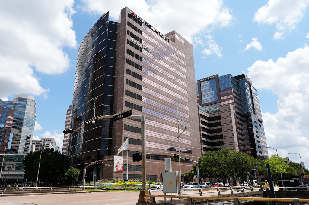 A portion of the Texas Children's Hospital campus is seen on Friday, Aug. 7, 2026, in Houston. (AP Photo/Ashley Landis)