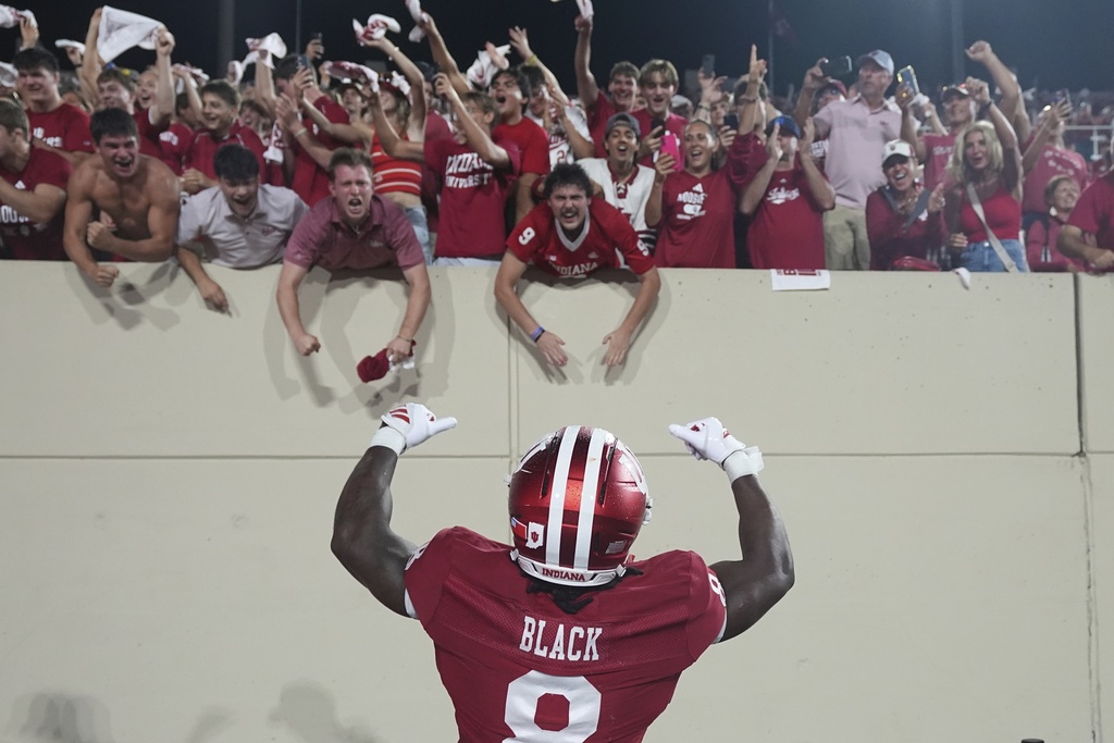 Indiana defensive lineman Stephen Daley celebrates with fans following an NCAA college football game against Illinois, Saturday, Sept. 20, 2025, in Bloomington, Ind. (AP Photo/Darron Cummings)