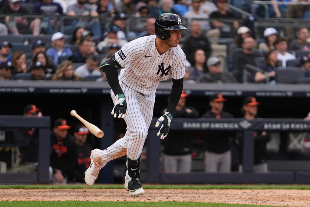 New York Yankees' Cody Bellinger runs to first base for an RBI single during the seventh inning of a baseball game against the Baltimore Orioles Saturday, May 2, 2026, in New York. (AP Photo/Frank Franklin II)