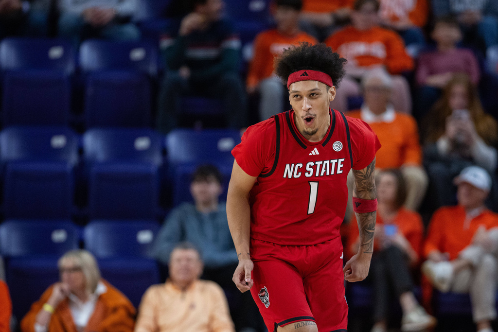 North Carolina State forward Darrion Williams (1) celebrates a three point basket against Clemson during the first half of an NCAA college basketball game Tuesday, Jan. 20, 2026, in Clemson, S.C. (AP Photo/Scott Kinser)