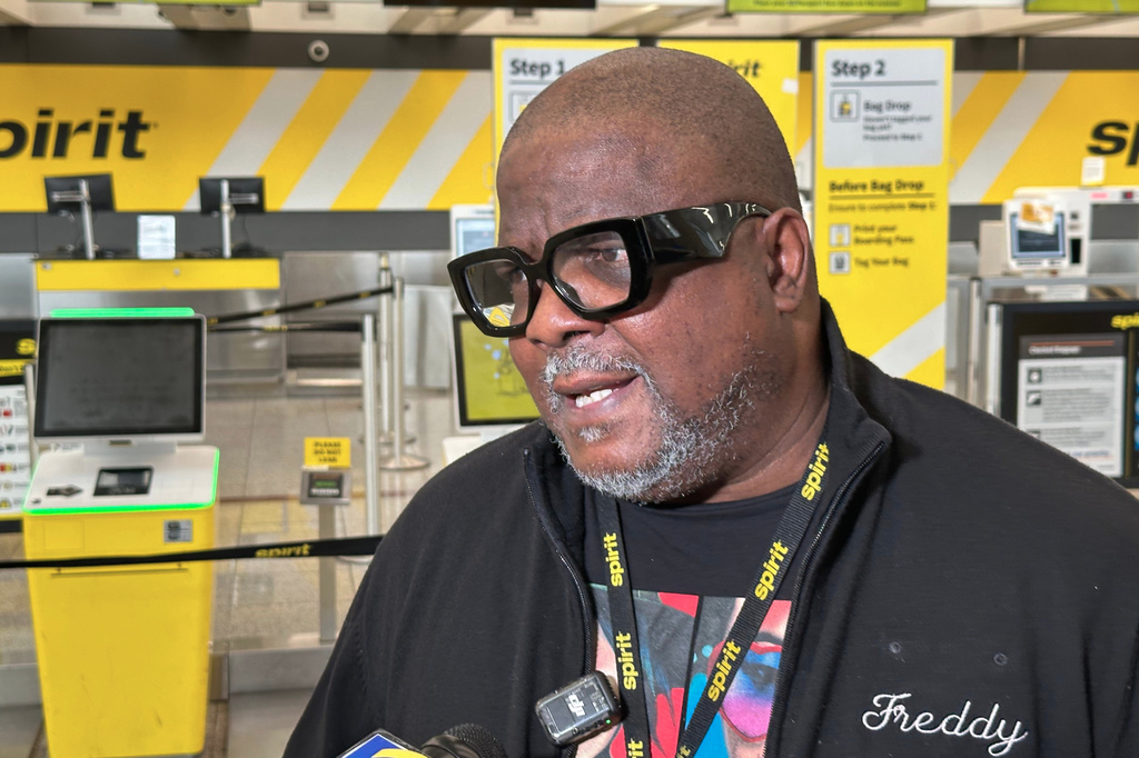 Laid-off Spirit Airlines flight attendant Freddie Peterson talks about the airline’s shutdown on Saturday, May 2, 2026 at Hartsfield-Jackson Atlanta International Airport in Atlanta. (AP Photo/Jeff Amy)