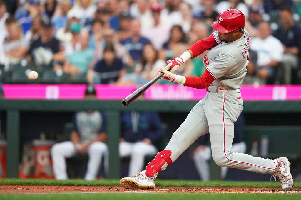 Philadelphia Phillies' Justin Crawford hits an RBI single during the second inning of a baseball game against the Seattle Mariners, Tuesday, Aug. 25, 2026, in Seattle. (AP Photo/Lindsey Wasson)