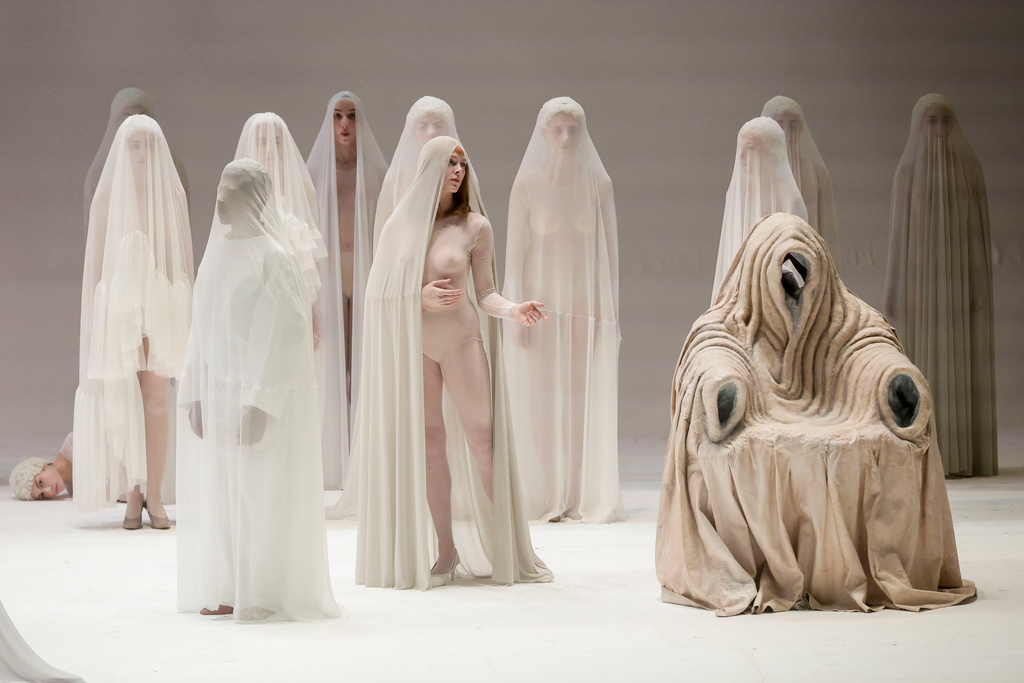 EDS NOTE: NUDITY - Actors perform during the general rehearsal of Ennio Morricone's only opera, Partenope, at the San Carlo Theatre, in Naples, Italy, Thursday, Dec. 11, 2025. (AP Photo/Salvatore Laporta)