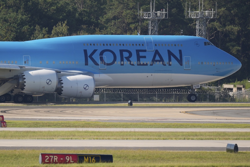 A Korean Air plane arrives at Hartsfield-Jackson International Airport in Atlanta, Wednesday, Sept. 10, 2025, in Atlanta. (AP Photo/Mike Stewart)