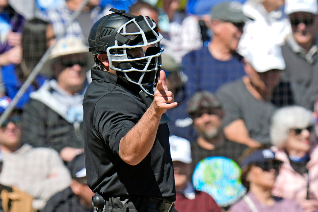 FILE 0 Home plate umpire Tom Fornarola calls a strike during the fifth inning of a spring training baseball game between the Toronto Blue Jays and the New York Yankees Tuesday, Feb. 24, 2026, in Dunedin, Fla. (AP Photo/Chris O'Meara, File)