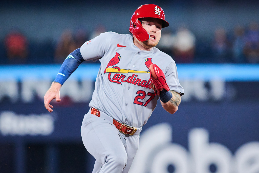 St. Louis Cardinals' Nathan Church sprints in to score on a double by Lars Nootbaar during the third inning of a baseball game against the Toronto Blue Jays in Toronto, Sunday, Aug. 2, 2026. (Sammy Kogan/The Canadian Press via AP)