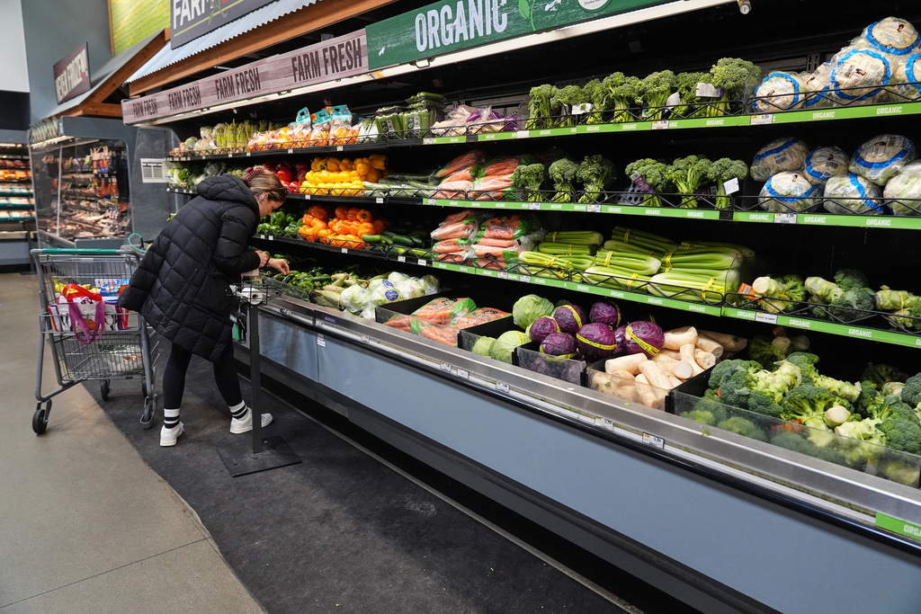 A person shops for produce, which is covered by the USDA Supplemental Nutrition Assistance Program (SNAP), at a grocery store in Baltimore, Monday, Nov. 10, 2025. (AP Photo/Stephanie Scarbrough)