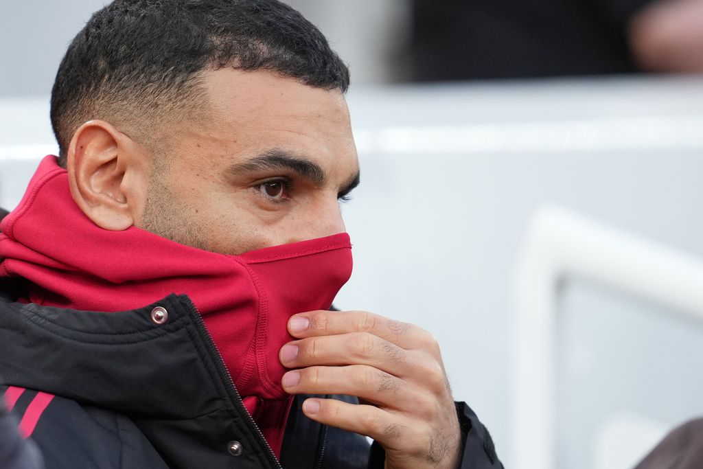 Liverpool's Mohamed Salah sits on the bench before the English Premier League soccer match between Liverpool and Brighton and Hove Albion in Liverpool, England, Saturday, Dec. 13, 2025. (AP Photo/Jon Super)