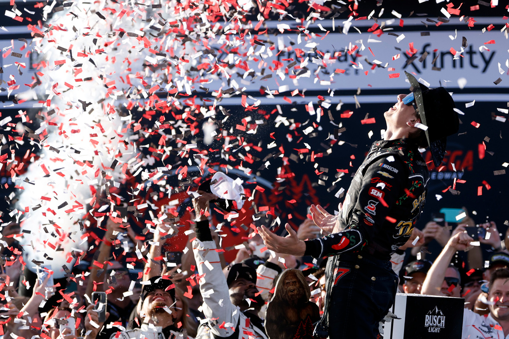 Carson Hocevar celebrates after winning a NASCAR Cup Series auto race, Sunday, April 26, 2026, in Talladega, Ala. (AP Photo/Butch Dill)
