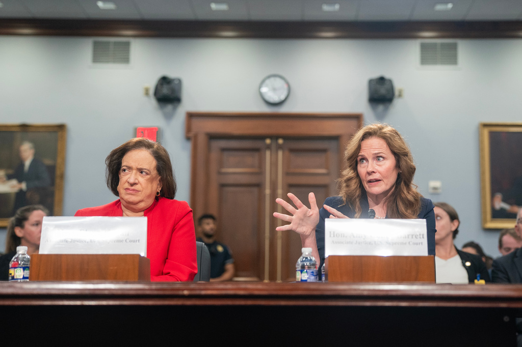 Supreme Court Justices Amy Coney Barrett, right, and Elena Kagan testify during a House Appropriations subcommittee hearing, Tuesday, July 14, 2026, on Capitol Hill in Washington. (AP Photo/Nathan Howard)