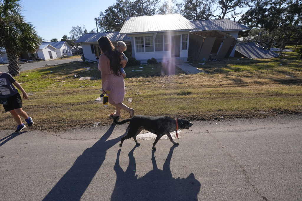 Supplies, emergency workers rushed to North Carolina while Florida digs