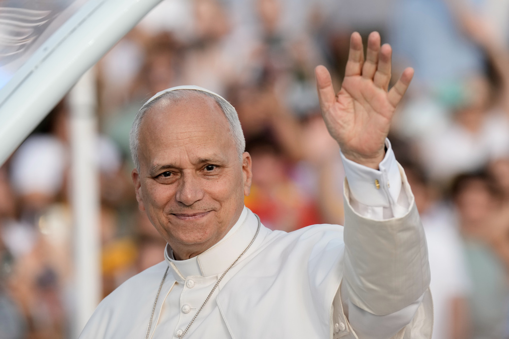 Pope Leo XIV waves as he arrives to attend a prayer vigil at Lluis Companys Olympic Stadium in Barcelona, Spain, Tuesday, June 9, 2026. (AP Photo/Bernat Armangue)