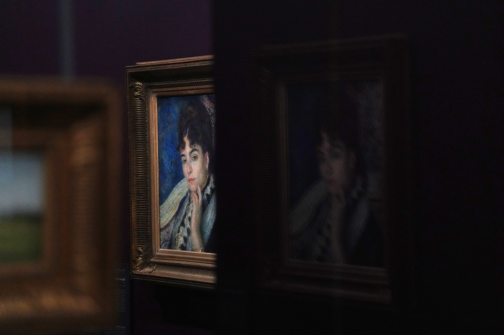 French painter Pierre-Auguste Renoir's painting titled Madame Alphonse Daudet is on exhibit at the Musée d'Orsay museum's new permanent gallery dedicated to so-called MNR artworks, pieces recovered after World War II whose ownership remains uncertain, in Paris, Monday, May 4, 2026. (AP Photo/Thibault Camus)